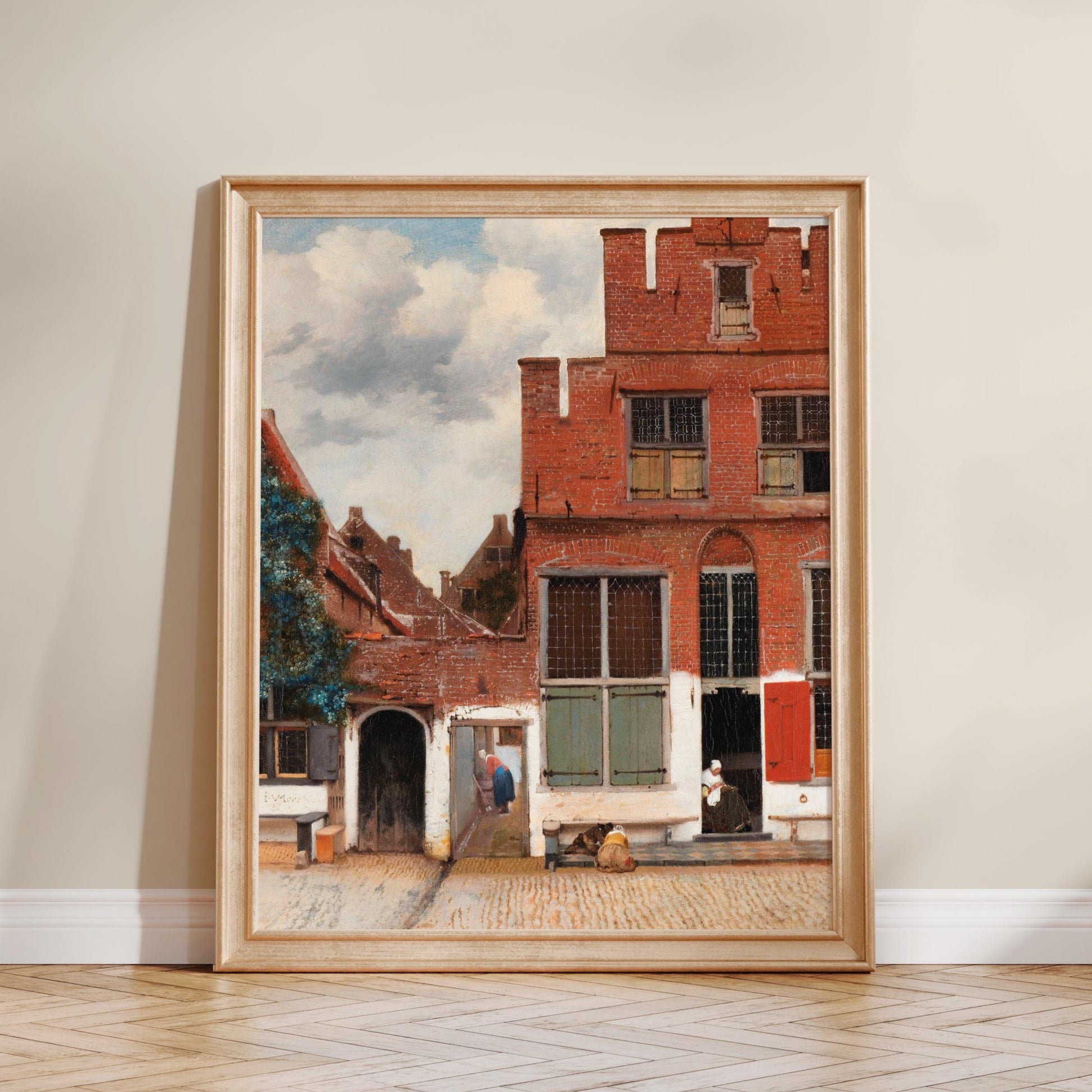 The image is a framed painting depicting a street scene with brick buildings, a person walking on the sidewalk, and a dog sitting on the ground.