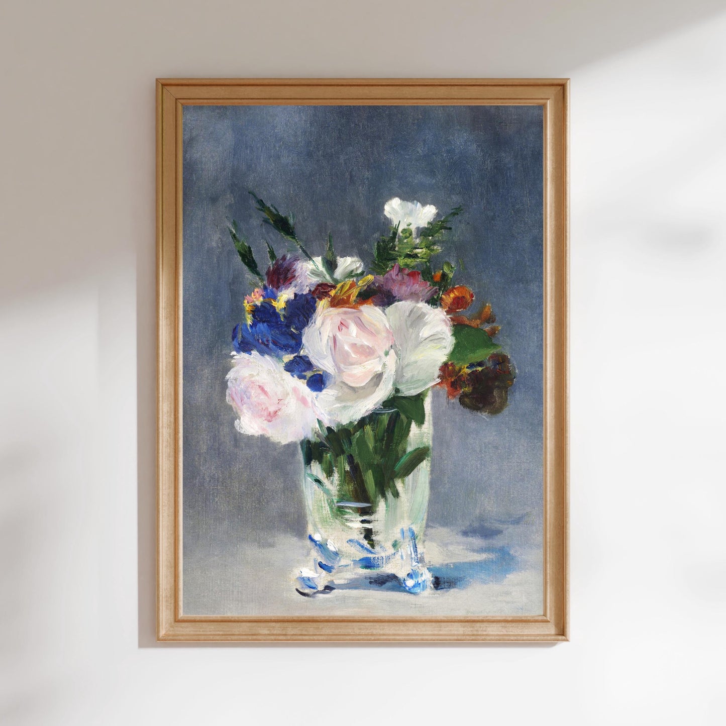 The image is a framed painting depicting a vase filled with colorful flowers, including white, pink, and purple blooms, set against a dark background.