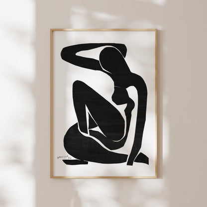 a black and white abstract art piece depicting a seated figure with a minimalist, geometric style.