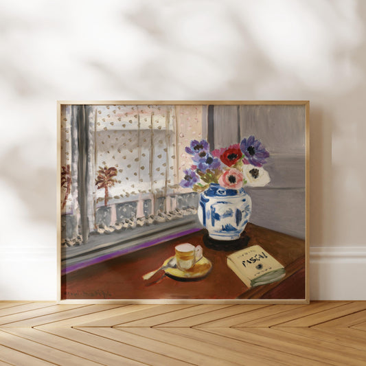 The image is a framed painting depicting a vase of colorful flowers on a table, with a book and a cup of tea nearby.
