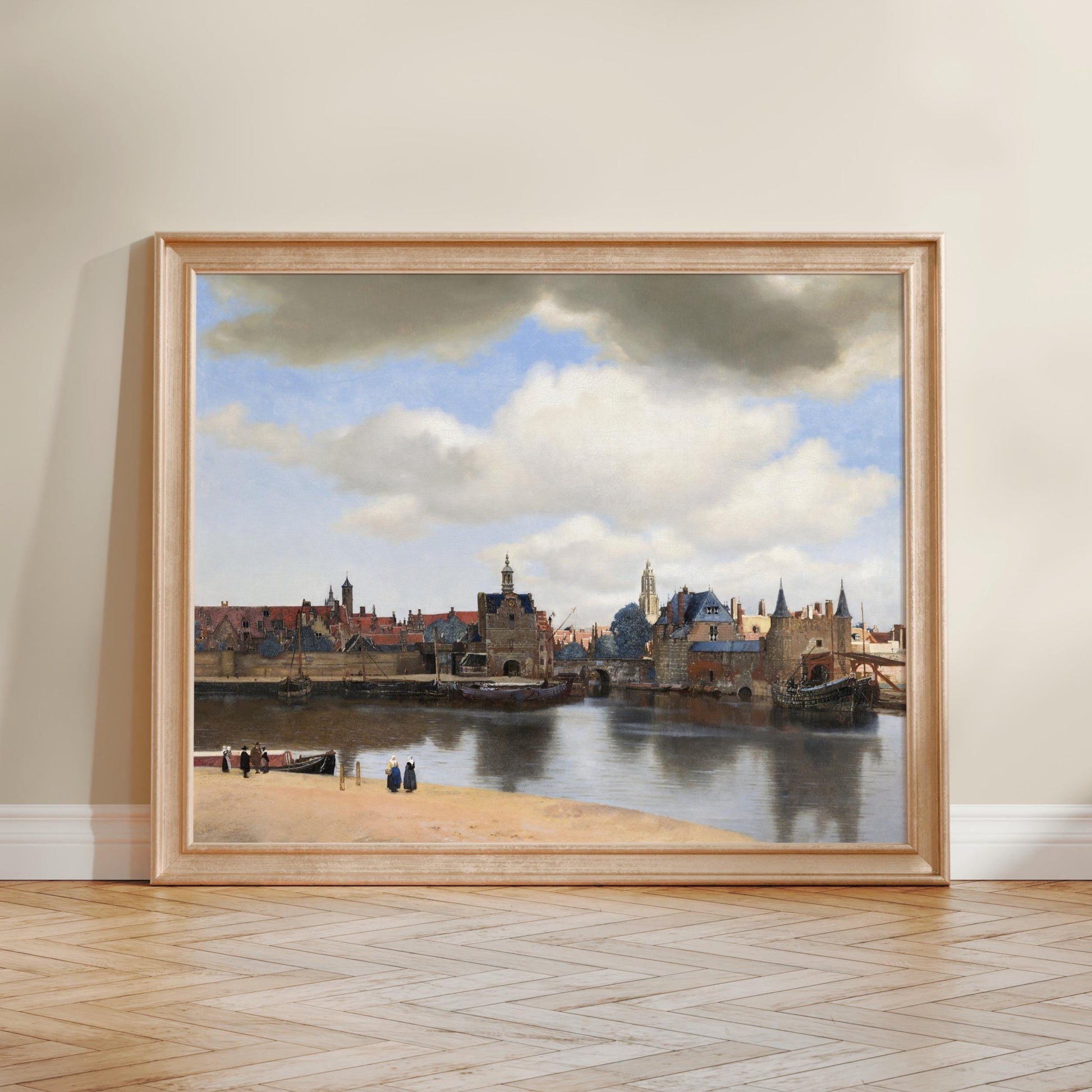 The image is a framed painting depicting a cityscape with a river and buildings in the background.